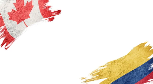 Bandeiras do Canadá e da Colômbia em fundo branco — Fotografia de Stock
